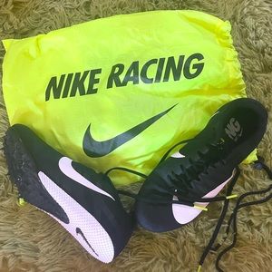 Nike track spikes, black and white, size 6.5